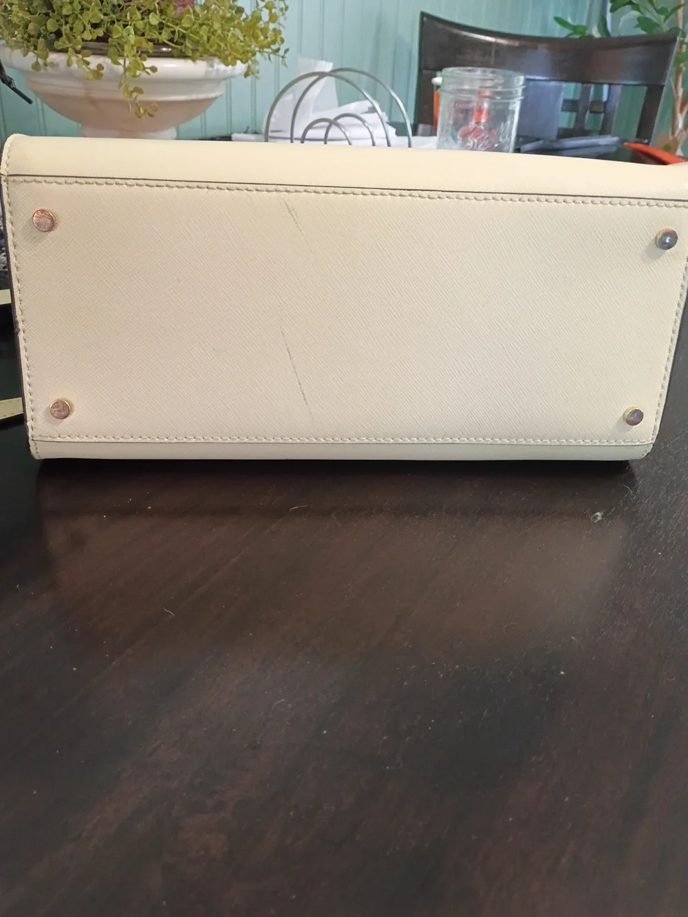 Kate Spade Staci Medium Satchel in a light yellow colorway.
